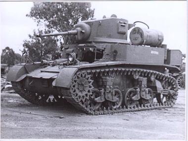 Army vehicle with caterpillar tracks.
