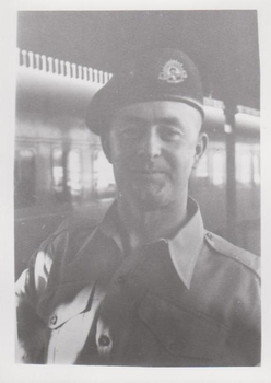 Photograph of soldier wearing beret.