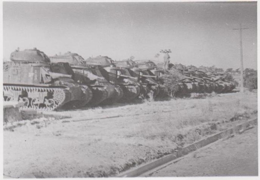 Row of large army tanks