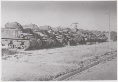 Row of large army tanks