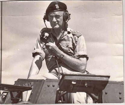 Soldier with microphone in vehicle