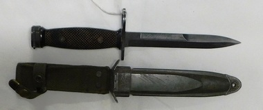 Short chunky knife with sheath.