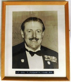 Man in formal dress with medals.