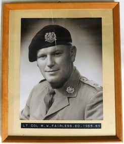 Army officer in uniform and beret.