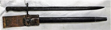 Long knife with leather sheath.