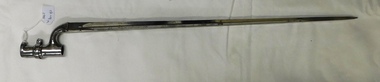 Long pointed spike with tube on one end