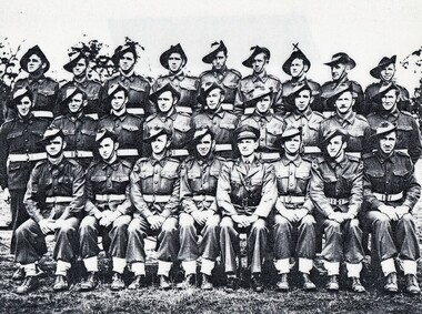 Group of soldiers arranged in three rows