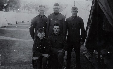 Five soldiers in dress uniform