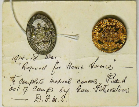 Two badges on card with description written on it.