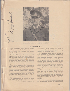 Magazine with photo of soldier on page.