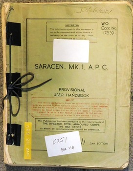 Army book with covers tied with cord at spine.