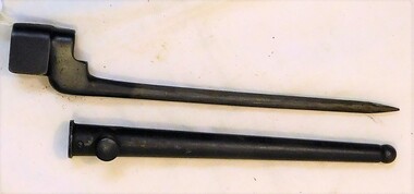 A spike with fitting on end and scabbard
