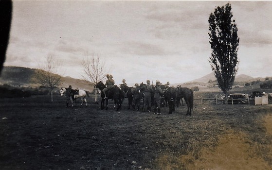 Soldiers with horses om arena