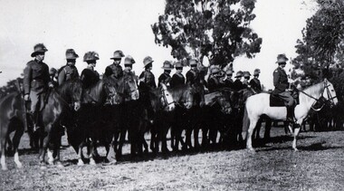 Line of soldiers on horseback.