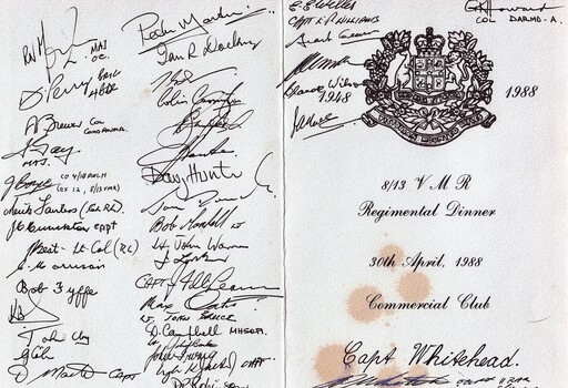 Menu card with autographs on it.