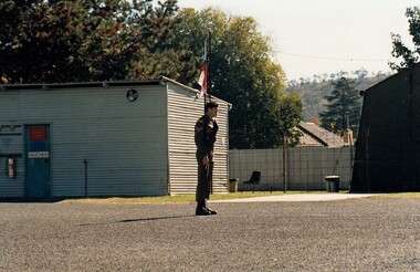 Lone soldier on parade ground with lance.