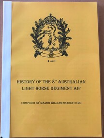 Book with badge on cover