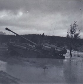 Tank  in difficulty crossing creek