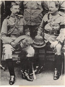 Two soldiers in dress uniforms