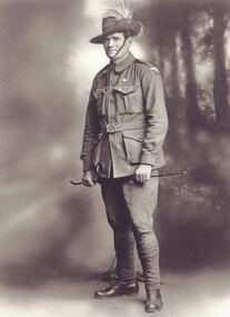 Soldier  in World war one uniform with swagger stick