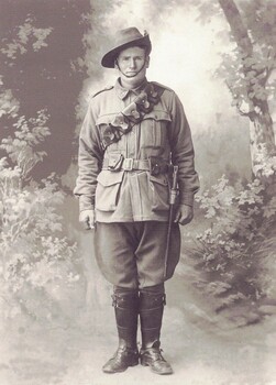 Soldier in world war one uniform with bayonet and bandolier