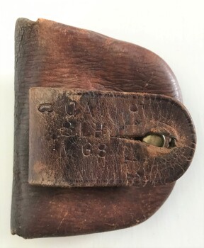 Watch case stamped "CA / 8LH / MGS"