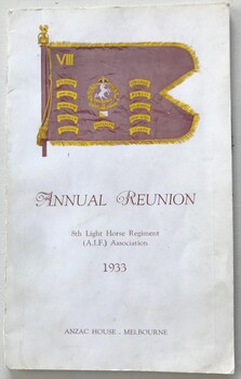 Folded program with colour image on front.