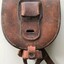 leather wallet big enough to hold two horse shoes.