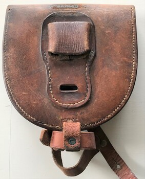 leather wallet big enough to hold two horse shoes.