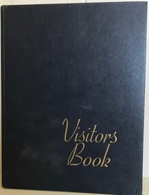 A black covered book fo visitors to record their names.