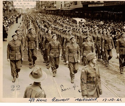 Soldiers wearing berets marching in Melbourne