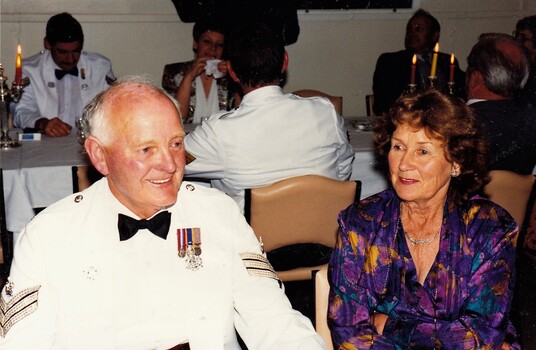 couple sitting  at dining table