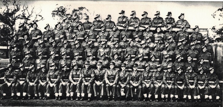 Large group of soldiers posed for photo.