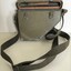 Small metal case with carry strap