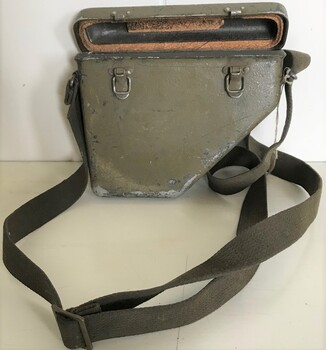 Small metal case with carry strap