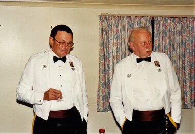 Two army officers in formal dress