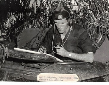 Soldier in turret of tank