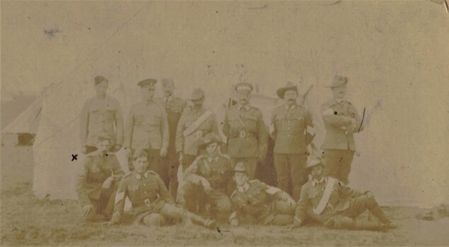 Faded photograph of group of soldiers