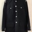 Army jacket with silver buttons and badges
