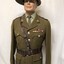 Soldier's uniform with belt and hat.