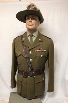 Soldier's uniform with belt and hat.