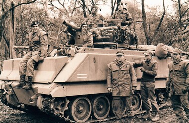 Grroup of soldiers with tank