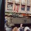 Tracked vehicle carrying soldiers with flags