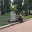 Soldier laying wreath at horse-trough memorial