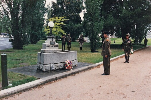 Soldier saluting at horse-trough Memorial