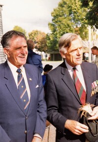 Two former soldiers at parade