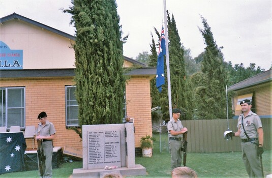 Soldiers at cenotaph on Anzac Day