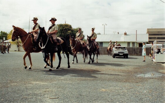 Lighthorsemen with car on parade ground