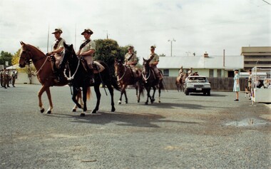 Lighthorsemen with car on parade ground