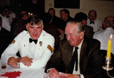 Soldier and civilian at dinner